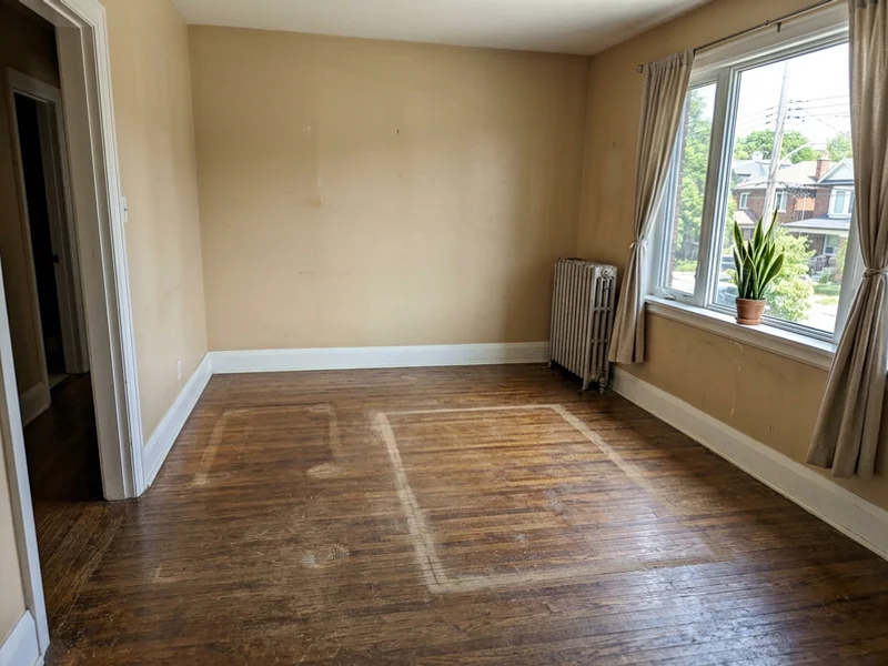 Empty living room after furniture removal